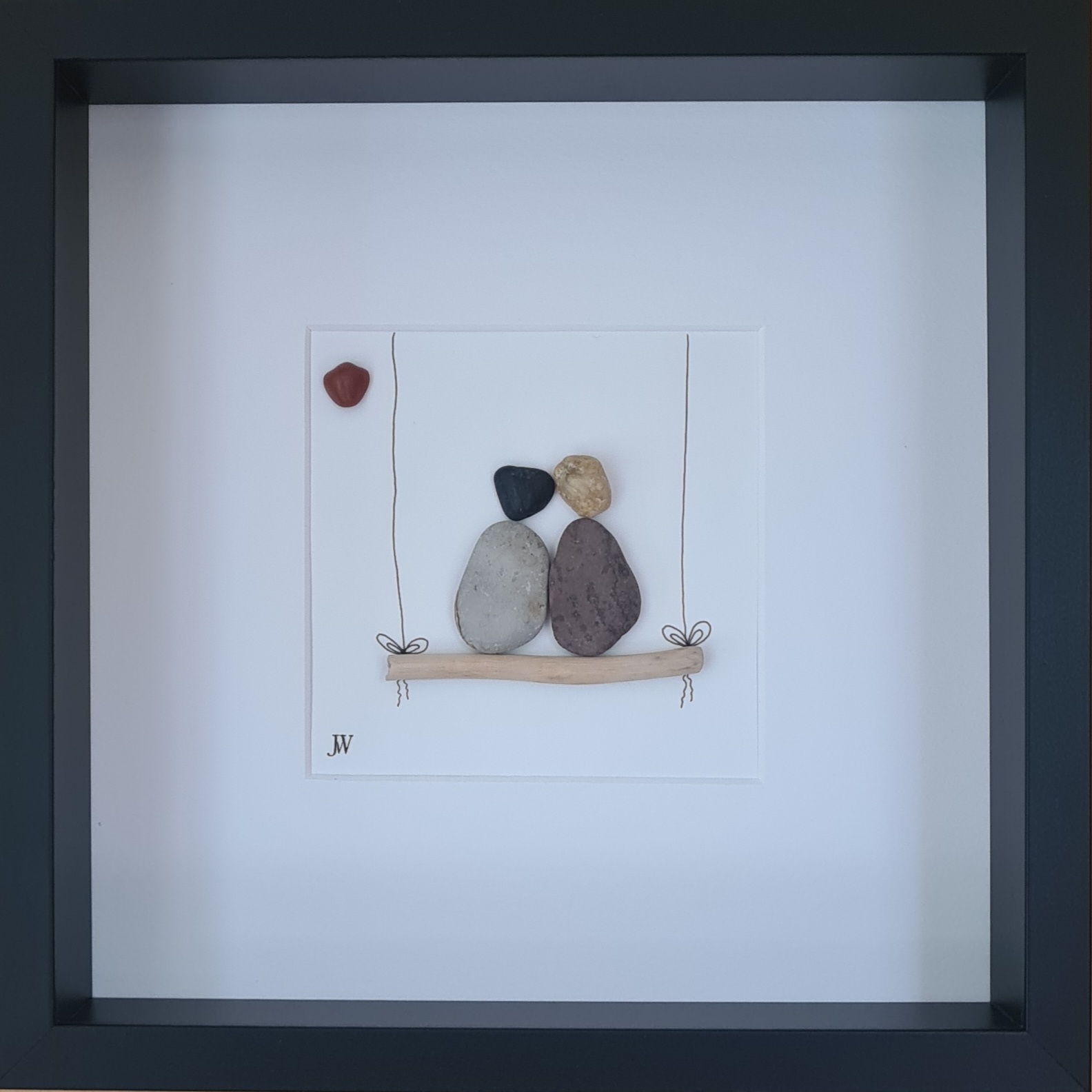 Pärchen auf Schaukel