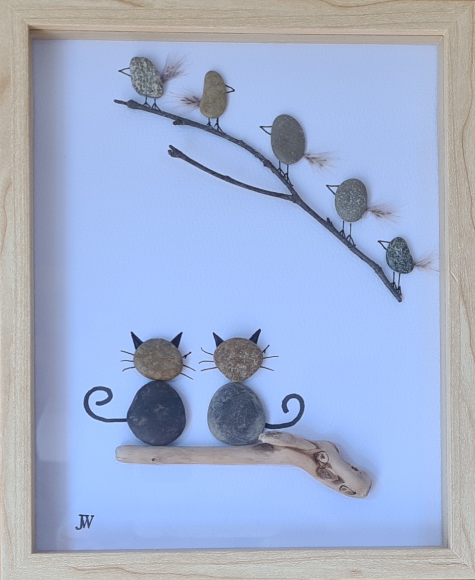 Katzen unter Vögeln